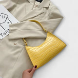 RAQUEL™ – Bolso brillante con estilo clásico